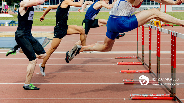 110 meter hurdles man runners running