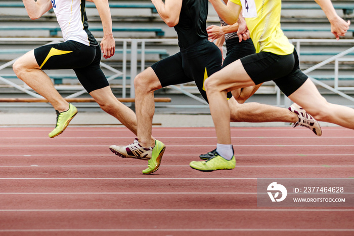 men athletes runners running race sprint in athletics