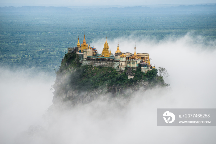 Mount Popa over the clouds in Bagan, Myanmar.