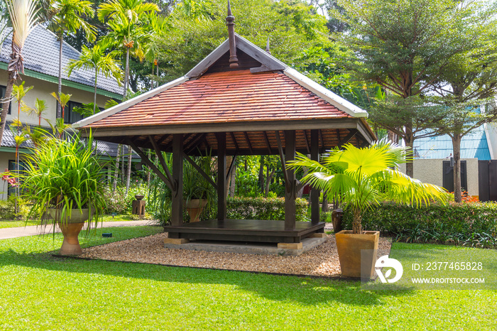 beautiful wooden gazebo and nice green lawn