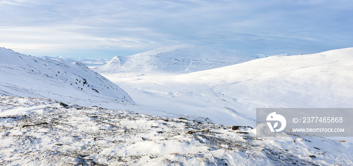 Scenic view of the snow covered landscape of the Dovre mountains in Norway at winter