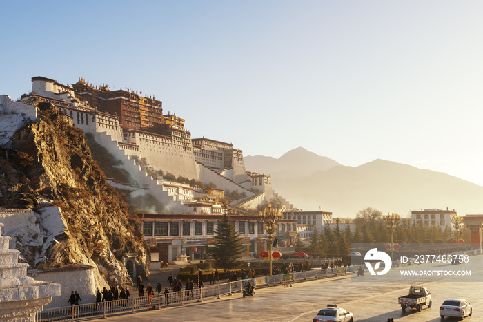 the Potala Palace and pagodas in the sunrise glow, Lhasa, Tibet