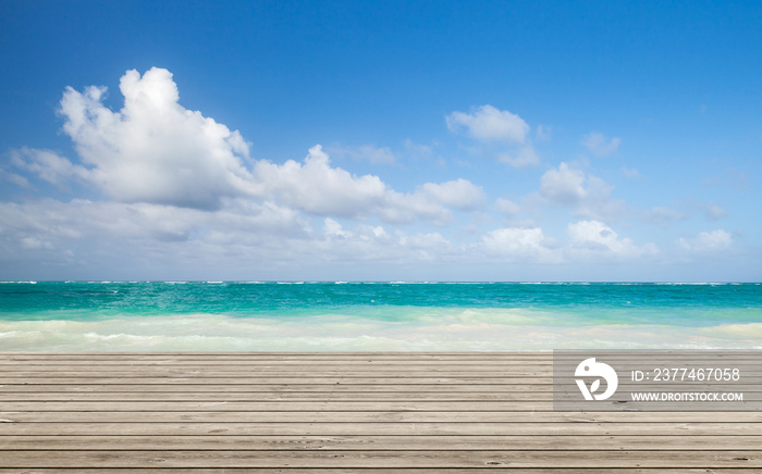 Wooden pier with bright ocean seascape