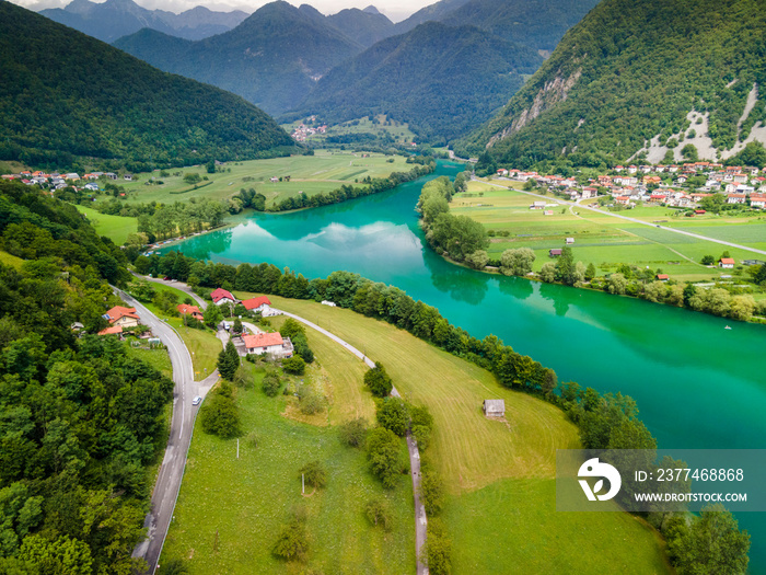 Emerald Green Watersin Soca River and Mountains in Tolmin Slovenia