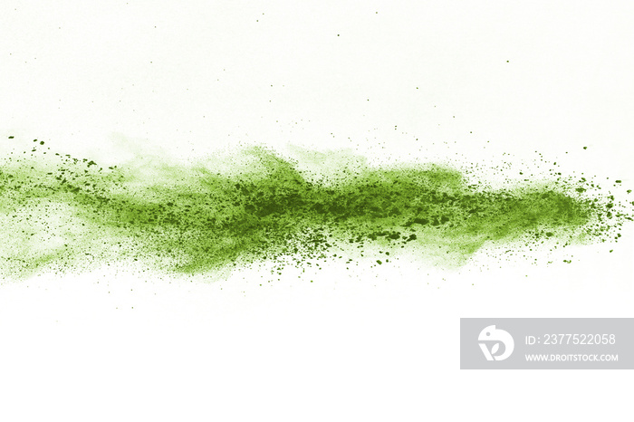 Green powder explosion on white background. Colored cloud. Colorful dust explode. Paint Holi.