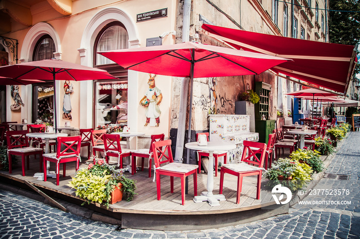 Lviv outdoor cafe with red umbrellas