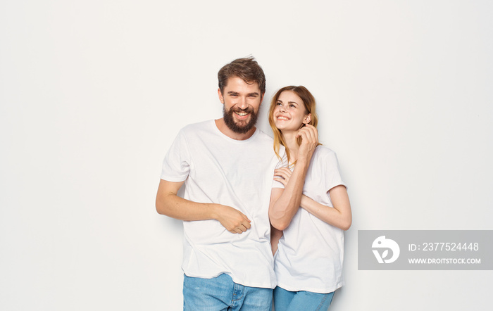 man and woman in white shirts