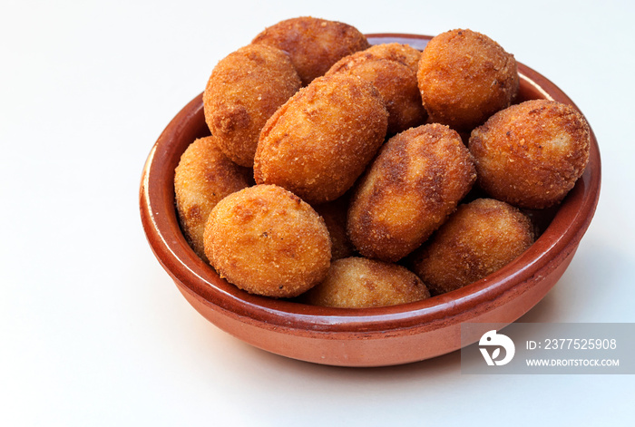 Croquettes surrounded by white background