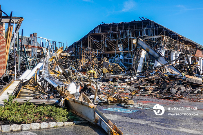 The interior structure of a building destroyed by fire full of debris