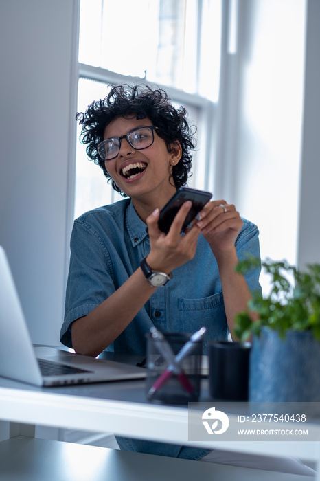 Young woman working in office