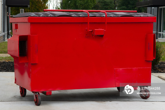 big red trash can