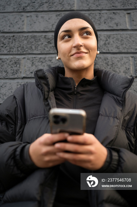 Young woman using smartphone