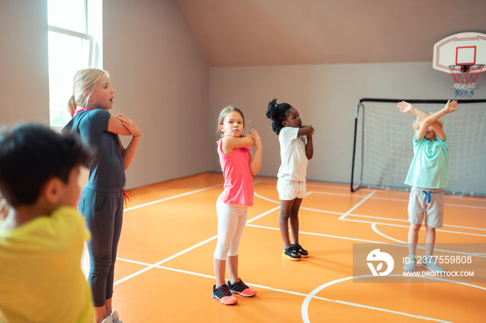 Pupils training together at the sports lesson.