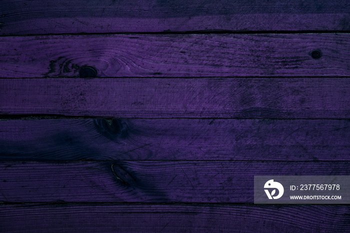 mysterious purple texture of wooden boards with natural patterns close-up