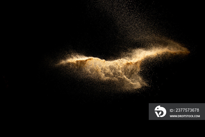 Abstract cloud motion blurred sand background.Sandy explosion isolated on over dark background.