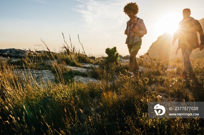 Young people hiking on a summer day