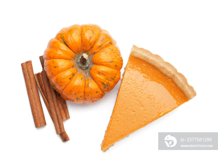 Composition with slice of tasty pumpkin pie on white background