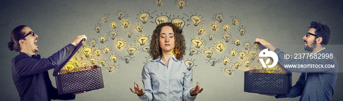 Two men sending ideas light bulbs to a meditating woman