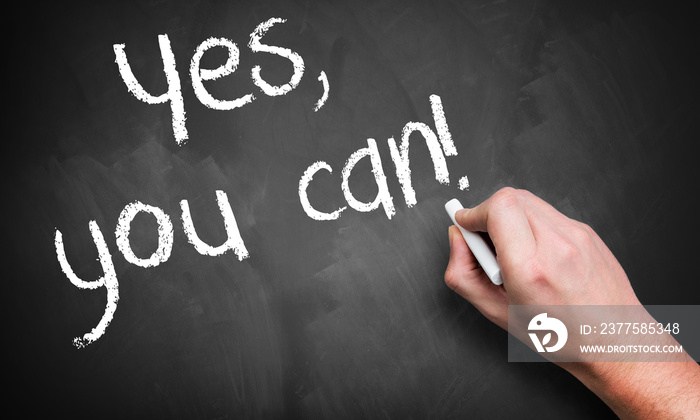 hand writing  yes, you can!  on a blackboard