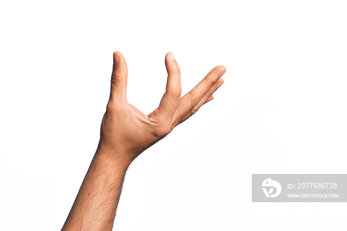 Hand of caucasian young man showing fingers over isolated white background picking and taking invisi