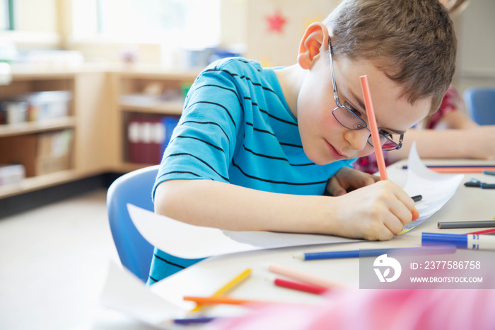 elementary student working on art project