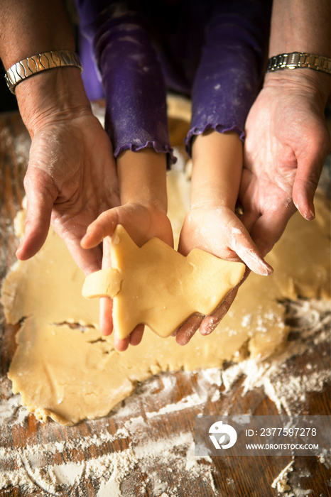 Grandmother baking with granddaughter (4-5)