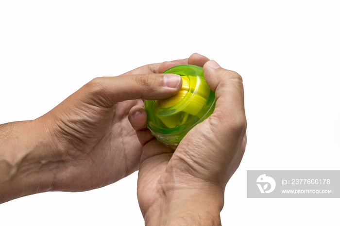 Hands Using Gyroscopic Ball For Exercise, Isolated On White Background