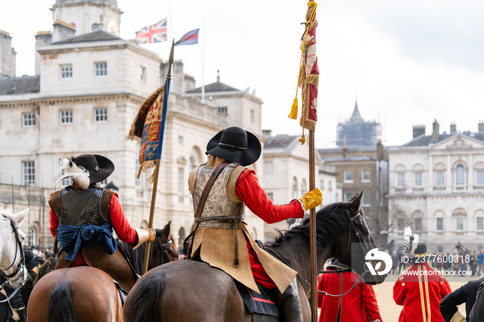 Mounted members of the English Civil War Society in historical costume, lead the parade to commemorate the execution of King Charles I