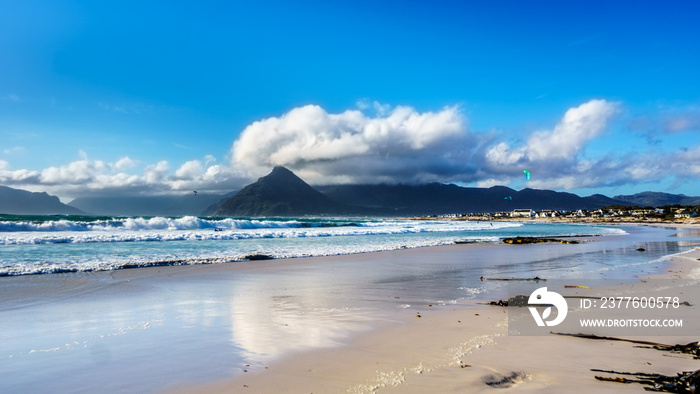 Kitesurfing at the beach community of Het Kommitjie on the Atlantic Ocean side of the Cape Peninsula in South Africa