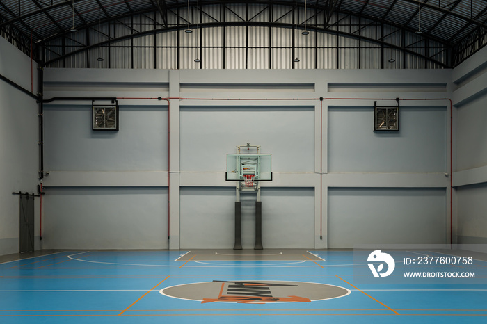 View from Empty basketball gym. Indoor basketball court, Interior of a basketball hall, Space for text, Selective focus.