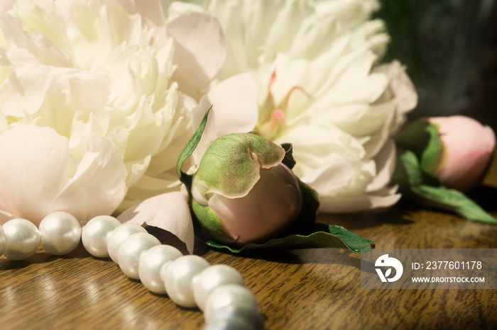 Spring. Spring flowers peonies with pearls. Beautiful bright background.