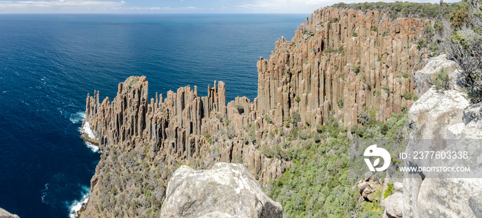 Panoramic, elevated view of Cape Raoul with its impressive formation of dolerite columns. Tasman National Park, Tasmania, Australia.