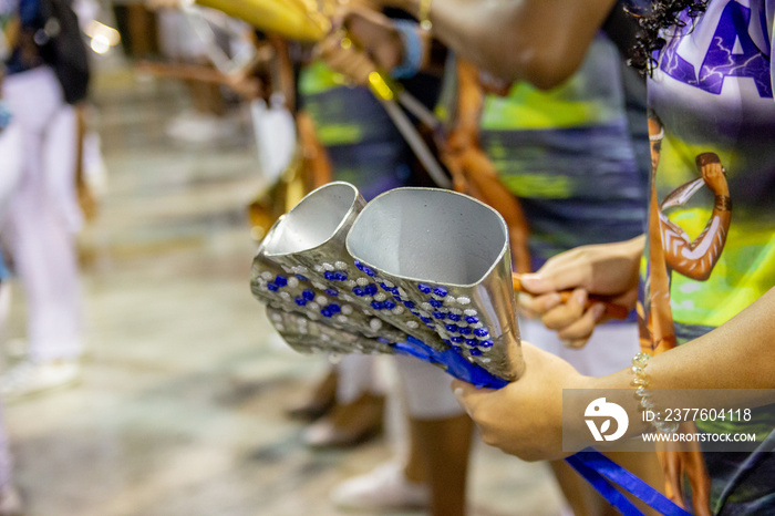 Components of the School of Samba portela playing the instrument agogô, during the technical rehearsal of the carnival.