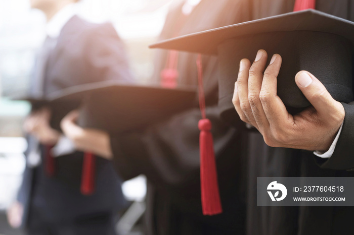 graduation,Student hold hats in hand during commencement success graduates of the university,Concept education congratulation.Graduation Ceremony,Congratulated the graduates in University.