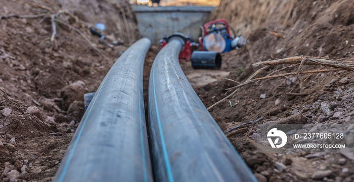 sewer pipes with water are laid underground