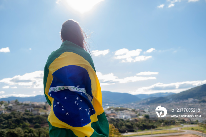 Woman with brazilian flag, independence day