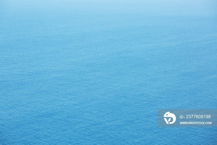 Blue Sea surface aerial view with waves from a drone, empty blank to  background