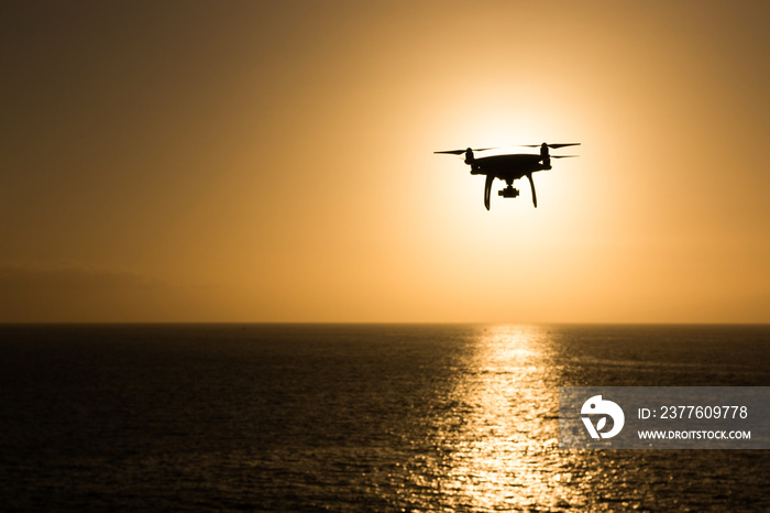 Drone DJI Phantom 4 at sunset in flight in Tenerife