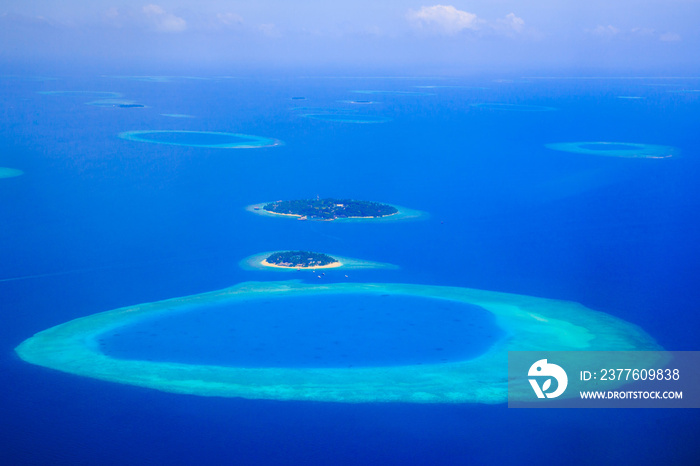 Amazing aerial view on the islands and atoll from above