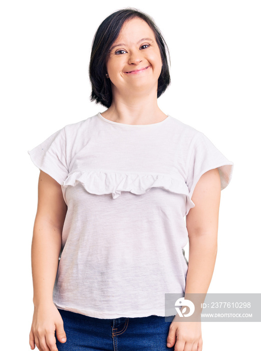 Brunette woman with down syndrome wearing casual white tshirt with a happy and cool smile on face. lucky person.