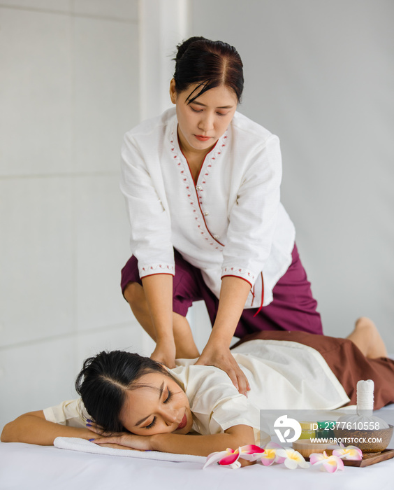 beautiful Asian lady lying relaxedly and enjoy Thai massage. Thai massage is for healing and relaxation. The Thai massage is Thailand’s alternative medicine