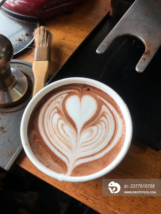 heart shaped coffee on table