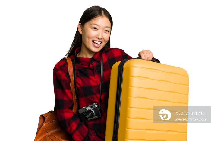 Traveler asian woman holding a suitcase isolated