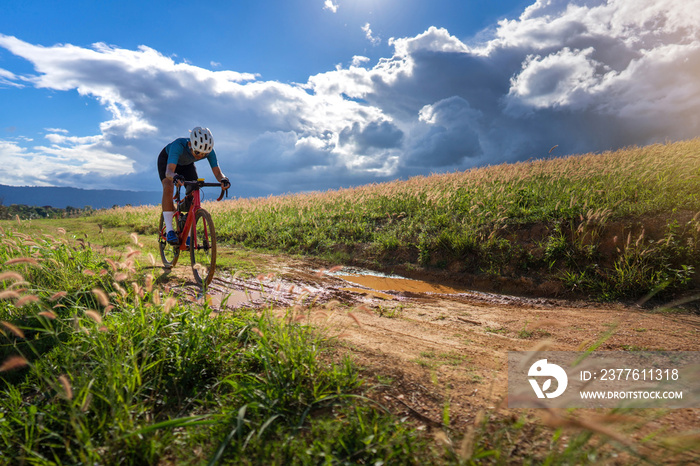 Cyclists practicing on gravel roads