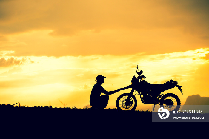 Motocross bike in mountain view with beautiful evening lights. motorcycle travel concept