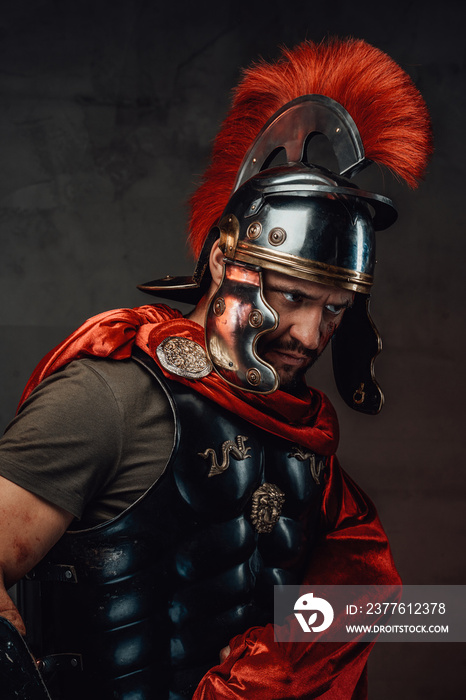 Imperial roman warrior with armour looking away