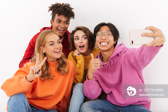 Group of cheerful teenagers isolated