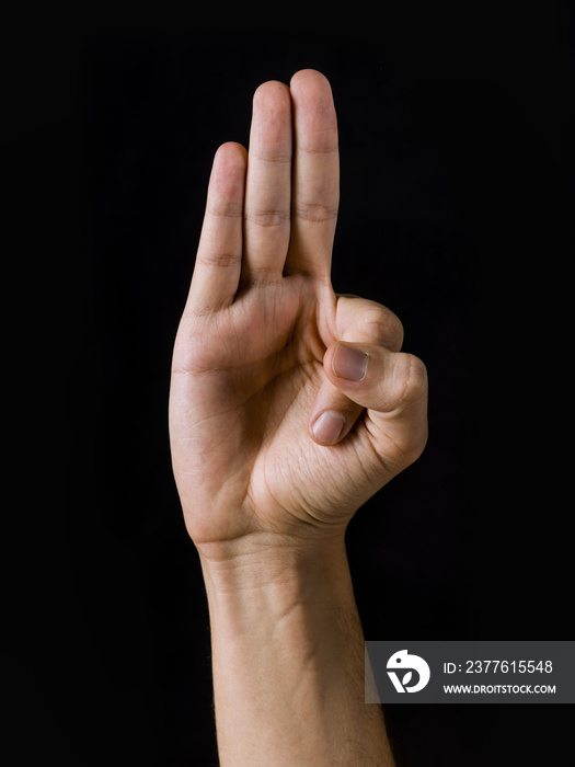 Close-up of a hand, practicing yoga, Vayu mudra