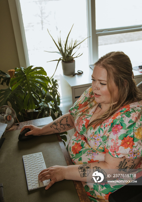 woman working on computer at home