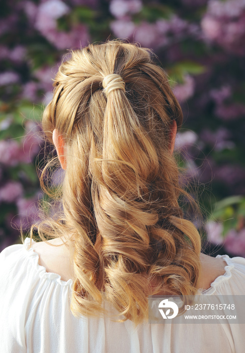 blond girl with curly hairstyle